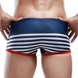 Men's Sexy Sailor Swim Trunks - Navy-Sexy tightly fitted sailor themed men's swim trunks made of nylon and spandex. Shipped from the USA.

Retro vintage short and tight swimsuit swimming briefs mens stripper stripping fetish gay clubwear uniform seaman naval navy blue costume cosplay knobs san francisco-L-