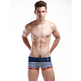 Men's Sexy Sailor Swim Trunks - Navy-Sexy tightly fitted sailor themed men's swim trunks made of nylon and spandex. Shipped from the USA.

Retro vintage short and tight swimsuit swimming briefs mens stripper stripping fetish gay clubwear uniform seaman naval navy blue costume cosplay knobs san francisco-