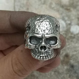 -Sterling Silver Road Rash Skull Ring Highly detailed human skull biker ring handcrafted in .925 sterling silver, treated with jeweler's antiquing and highly polished for the best possible presentation.Available in full and half US sizes 7-15. Measures approximately 26mm / 1 inch and weighs approximately 0.71oz in sterling si-