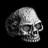 -Sterling Silver Road Rash Skull Ring Highly detailed human skull biker ring handcrafted in .925 sterling silver, treated with jeweler's antiquing and highly polished for the best possible presentation.Available in full and half US sizes 7-15. Measures approximately 26mm / 1 inch and weighs approximately 0.71oz in sterling si-7-