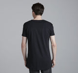 -A modern tee featuring a slim fit with an oversized neck opening and a asymmetrical hem, finished with a water-based ink print. Made with pride in California. Designer streetwear fashion brand swoosh logo parody. -