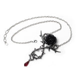 -Roses are red, or so the aphorism goes... but not in the mountains of Romania, where the darkest of romances prevail. Lead and nickel free Fine English Pewter. Genuine Alchemy Gothic product. Shipped from the USA. 
black rose goth gothic necklace thorned vine crystal drop dark romance valentines day love hearts-