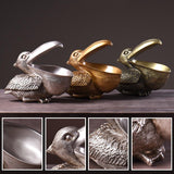 Pelican Big Mouth Sea Bird Valet Sculpture Trinket Jewelry Change Dish-High quality resin Hippo sculpture. The big open mouth on this statue creates a small bowl which is great for keys, coins, jewelry, candy, etc. Fun, stylish and multi-functional home decor. 22 x 30 x 16 cm change dish, jewelry holder, valet tray, party serving bowl, African animal sea bird gift. Free Shipping Worldwide-