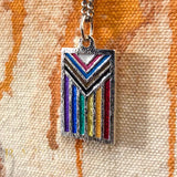 -Jeweler crafted sterling silver LGBTQ Pride Flag pendant with hand-enameled rainbow stripes, on your choice of chain or leather cord. Brand New in jewelers box. Made in and shipped from the USA. Gay Pride, GLBT, LGBT, LGBTQ, LGBTQ+, LGBTQIA, LGBTQX, LGBTQIA Plus, LGBTQ Love is Love Equality Jewelry Gift-