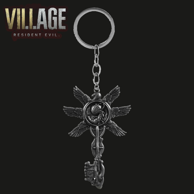 -Six Winged Unborn Key replica from Resident Evil 8: Village. Full size key pendant measures roughly 5.2 x 8cm / 2 x 3.15 inches on key holder ring. Free shipping.

RE8 zombie biohazard cosplay accessory prop replica gamer gaming Moreau Heisenberg stronghold feathered fetus key chain gift -