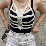 -Sleeveless irregular knitted skeletal ribcage vest / halter top, Polyester fiber, see sizing info below. Free shipping from abroad with average delivery in 2-3 weeks.

goth gothic punk halloween womens non binary unisex cut-out hollowed out woven crocheted fall fashion accessory small medium larger xl skeleton skeletal-S-