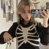 -Sleeveless irregular knitted skeletal ribcage vest / halter top, Polyester fiber, see sizing info below. Free shipping from abroad with average delivery in 2-3 weeks.

goth gothic punk halloween womens non binary unisex cut-out hollowed out woven crocheted fall fashion accessory small medium larger xl skeleton skeletal-