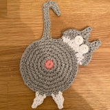 Cat Butt Coasters - Funny Feline Crocheted Drink Coasters -It may seem very un-catlike to protect furniture and help keep objects on surfaces but that's just what these kitties do... while still being a bit rude about it! Handmade durable high quality crochet knitted cotton kitty coasters. Sold individually or as a set of 8. Free shipping. Unique novelty gift home decor woven-