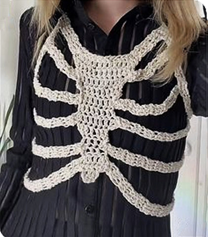 -Sleeveless irregular knitted skeletal ribcage vest / halter top, Polyester fiber, see sizing info below. Free shipping from abroad with average delivery in 2-3 weeks.

goth gothic punk halloween womens non binary unisex cut-out hollowed out woven crocheted fall fashion accessory small medium larger xl skeleton skeletal-