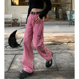 -Retro vintage women's light wash denim jeans in pink with high waist, zipper fly and wide stovepipe legs. Detailed with three, black hollow stars with elongated upper point on the outside of each leg. See size chart.
y2k streetwear alternative punk rave goth emo club 90s mall fashion -Pink-S-