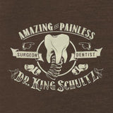-Amazing and painless, unless you have wronged him in some way. Thanks to a fortuitous turn of events, it was the good doctor who unchained Django... dentist turned bounty hunter Dr. King Schultz. Fitted juniors tee with screenprinted design incorporating spring-mounted molar tooth from his dental wagon. Ships from USA.-Chocolate Brown-Small-