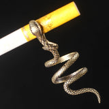 -Antique style cigarette holder ring shaped like a striking snake. Gunmetal, antiqued gold or silver finish. Free shipping, avg delivery 2-3 weeks.

metal smoking accessory smoker gift cigar cigarillo joint holder funny unique vintage flapper roaring twenties ancient egyptian cosplay goth gothic jewelry asp snek unique
-