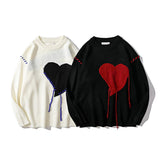 -Lightweight acrylic wool knit sweater with rough stitched heart and shoulder accent stitching. Handcrafted elements will vary slightly. Oversize unisex style, see size charts. Free shipping.

Harajuku love rough knitted ugly sweater unisex mens womens punk goth gothic black red catcase pullover jumper top-