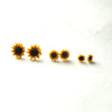 High Quality Resin Sunflower Stud Earrings, 15mm 18mm or 25mm-Pair of well crafted, bright and sunny resin sunflower stud earrings in your choice of 15mm, 18mm or 25mm.Free Shipping Worldwide. These earrings ship from abroad and typically arrive in about two weeks. Cute sun flower black eyed susan summer yellow floral fashion accessory -