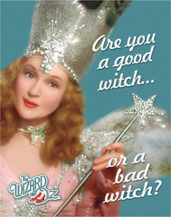 Wizard of Oz Are You A Good Witch or A Bad Witch? Tin Sign-The Wizard of Oz Glinda "Are you a good witch... or a bad witch?" metal sign.High quality lithograph print, scratch and rust resistant, folded corners with four holes for hanging or mounting. 12.5x16in, Officially licensed. Made in the USA. Glinda Baum MGM movie fantasy witches witchcraft funny glenda quote-