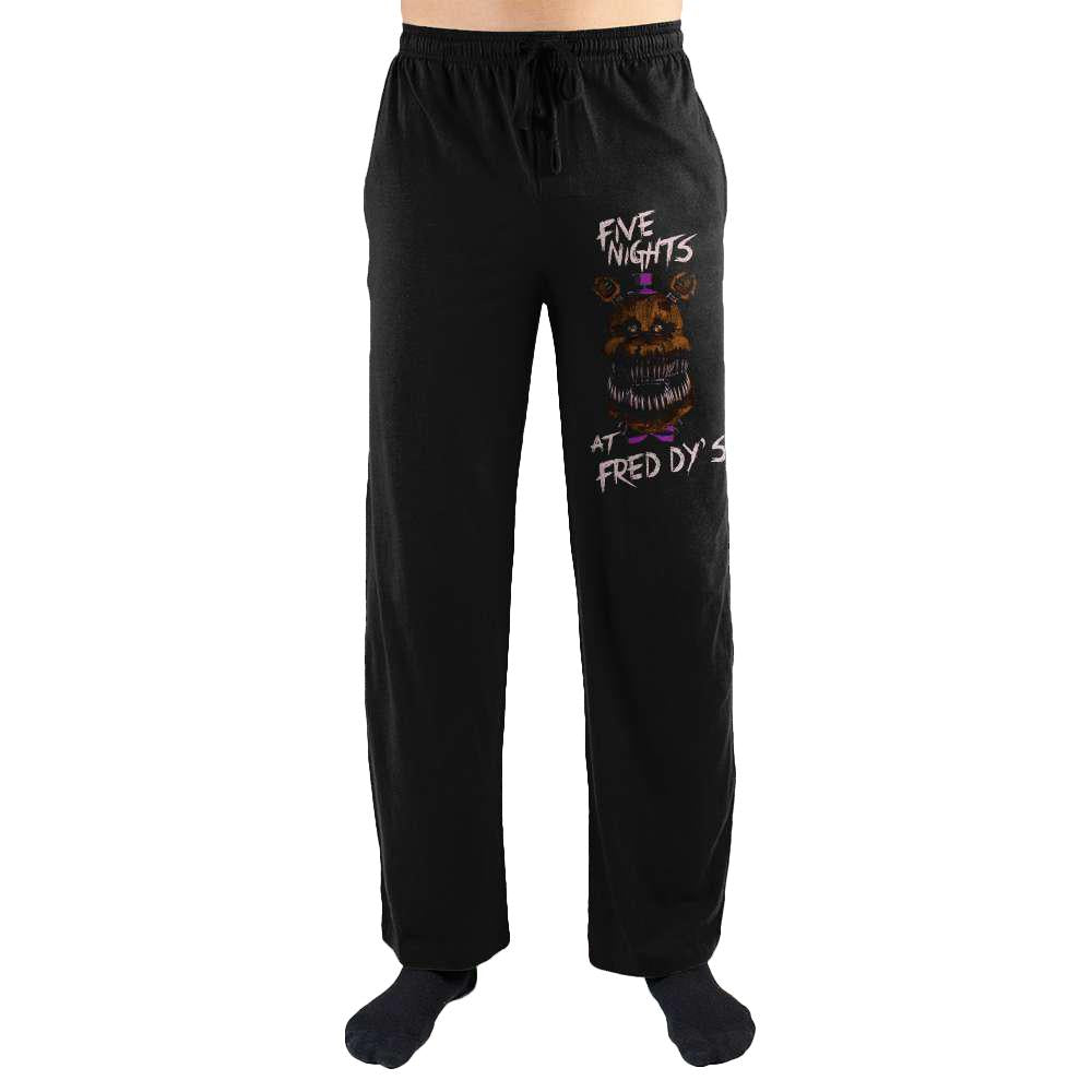 Five Nights at Freddy’s Jumpscare Lounge Pants, Officially Licensed-High quality FNAF sleep pants featuring a high quality graphic of a bloodthirsty Freddy Fazbear on left leg. Soft breathable cotton / poly blend unisex loungewear / sleepwear pajama pants with elastic waistband and drawstring. Officially licensed Five Nights at Freddy's apparel. Shipped from USA. Jumpscare videogame-BLACK-S-