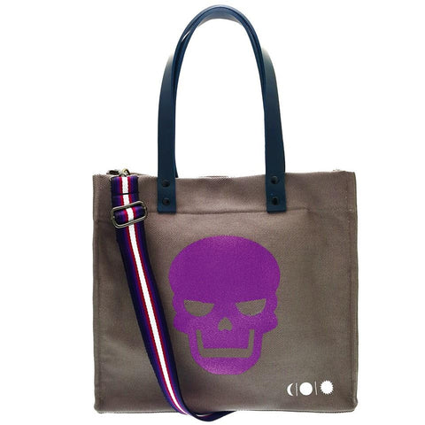 -Large cotton canvas beach bag in gunmetal gray with glittery purple skull. Adjustable strap for use as an over the shoulder bag, high quality leather straps for carrying as a handbag. Handmade in Athens, Greece. Free Shipping Worldwide. Summer Designer Goth Gothic NuGoth Carryall Tote Bag Military Imported Fashion -