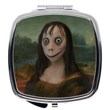 -Round or square silver compact mirror with high quality printed image. 

Portable purse makeup accessory bff gift Creepy weird funny momo meme creepypasta fine art memes Da Vinci painting bizarre scary halloween haunted house portrait joke viral challenge disturbing face bird woman beautify beauty weirdo goth gothic-Square-2.25x2.25 inch-
