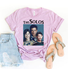 Funny Retro Vintage THE SOLOS Graphic Tee, Star Wars Sitcom Parody-Unisex style premium quality ringspun cotton tee. Soft and comfortable Bella+Canvas shirt with a standard retail fit. Made to order. Free shipping from the USA. Funny 80s 90s kid 1980s 1990s TV retro vintage y2k sitcom family portrait hans solo kylo ren princess leia television parody womens ladies juniors shirt gift-
