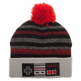 Nintendo NES Controller Embroidered Pom Beanie, Officially Licensed-Keep cozy in the Ice Land levels in Super Mario Bros 3 in this Nintendo NES Controller Embroidered Pom Beanie hat.Black, red, and gray striped knit acrylic, gray cuff embroidered with an NES controller, topped with a fuzzy red pompom. Officially Licensed Nintendo apparel. Ships from USA. Retro Gamer Gaming Gift Winter-MULTI-OS-