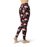 Holiday Skull Jeggings-These handmade jean leggings are made of soft and stretchy Lycra (88% polyester / 12% spandex) feature a high waistband, premium quality print and flat lock sport stitching. Made in the USA. Free Shipping Worldwide. Christmas holiday Santa hat skull yoga -