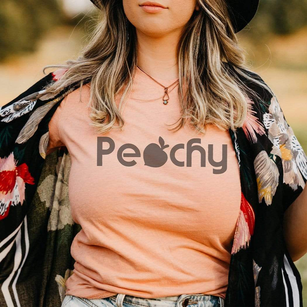 Peachy Retro Graphic Tee, Unisex -Vintage faded tees with a modern twist! Ultra-soft, premium triblend or 50/50 poly cotton blend unisex shirts. Eco-friendly, water-based inks. Graphic print is soft to the touch. Shipped from the USA. Peach womens mens unisex Georgia GA Atlanta ATL south southern belle georgian southerner peachy summer.-