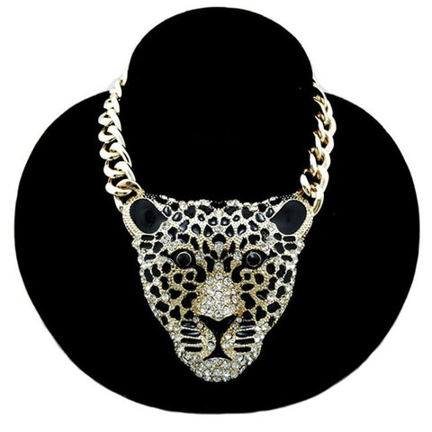 -Large rhinestone leopard head pendant on thick link chain. Nicely detailed and well made in lighter weight alloy metal with goldtone and silvertone finish. Free shipping from abroad with an average delivery time to the USA of about 3 weeks.

Leopard hip-hop hiphop fashion bling classic jungle big cat -Silvertone-