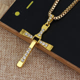 Dominic Toretto Cross Necklace -Quality replica of Dominic Toretto's cross necklace from the Fast and Furious movies. The alloy metal and crystal cross pendant measuring 3.9x5.1cm/1.5x2in, available in silver or gold finish. Free shipping.

Prop replica mens jewelry religious crystal cross christian pendant necklace racing film franchise fan gift.-