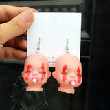 -Uniquely creepy vintage style babydoll head earrings. Free Shipping Worldwide. These ship from abroad and typically arrive in about 2 weeks. Funny weird emo goth gothic harajuku punk baby doll head drop / dangle earrings. -