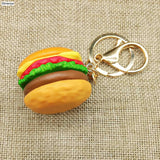 -A cheezeburger you can always haz! High quality resin hamburger keychain / bag charm. A detailed miniature burger with choice of a silver or golden keyring and clip. Free Shipping Worldwide. Great meme key chain / keyring gift for fast food lovers, those who enjoy Americana and USA iconography or Steven Universe fans.-