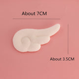 -Small anime inspired cloud style angel wing hair barrettes. Free shipping from abroad. These typically arrive in about 2 weeks to the USA. Sold in pairs of two. Cute Kawaii fluffy unique cosplay clip hair accessory.-