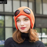-Fashionable thick (160g) plush lined, knit polyester beanie with bomber cap style ear flaps and built in tinted goggles. Orange, black, white, green, purple, blue or yellow modern European style winter hat. A fun and functional fashion accessory for travel and outdoor activity on cold days. Free Shipping Worldwide. -Orange-