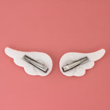 -Small anime inspired cloud style angel wing hair barrettes. Free shipping from abroad. These typically arrive in about 2 weeks to the USA. Sold in pairs of two. Cute Kawaii fluffy unique cosplay clip hair accessory.-