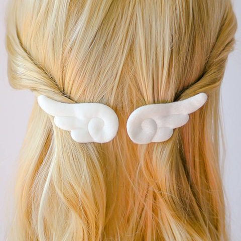 -Small anime inspired cloud style angel wing hair barrettes. Free shipping from abroad. These typically arrive in about 2 weeks to the USA. Sold in pairs of two. Cute Kawaii fluffy unique cosplay clip hair accessory.-One Pair-