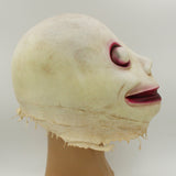 -Disturbing and unique, ghostly and ghastly grinning face latex over the head mask. One size fits most. Free shipping from abroad. Typically arrives in 2-3 weeks to the USA. Strange funny weird weirdest creepy bizarre freaky momo smiling smile challenge cursed halloween costume cosplay scary -