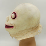 -Disturbing and unique, ghostly and ghastly grinning face latex over the head mask. One size fits most. Free shipping from abroad. Typically arrives in 2-3 weeks to the USA. Strange funny weird weirdest creepy bizarre freaky momo smiling smile challenge cursed halloween costume cosplay scary -