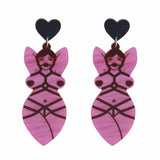 -A pair of kinky acrylic dangle earrings of a bound, nude full figured woman with heart pasties and ball gag. Free shipping.

unique adult mature kink bdsm sexy retro kitsch goth gothic punk nude edgy provocative fashion sexual s&m sado masochism sadist masochist sub girl subbie subby dom dominant erotic art-