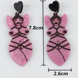 -A pair of kinky acrylic dangle earrings of a bound, nude full figured woman with heart pasties and ball gag. Free shipping.

unique adult mature kink bdsm sexy retro kitsch goth gothic punk nude edgy provocative fashion sexual s&m sado masochism sadist masochist sub girl subbie subby dom dominant erotic art-