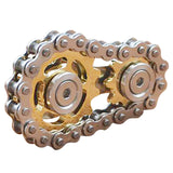 -Metal bicycle-style chain and sprocket fidget toy. Durable, high quality construction. Measures approximately 3cm x 6cm / 1.2 x 2.4 inches. Free shipping from abroad. Typically arrives in about 2-3 weeks.

Unique different spinning link chain and gear anxiety diffusing perpetual motion machine toy-Gold and Silver-