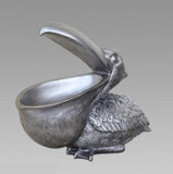 Pelican Big Mouth Sea Bird Valet Sculpture Trinket Jewelry Change Dish-High quality resin Hippo sculpture. The big open mouth on this statue creates a small bowl which is great for keys, coins, jewelry, candy, etc. Fun, stylish and multi-functional home decor. 22 x 30 x 16 cm change dish, jewelry holder, valet tray, party serving bowl, African animal sea bird gift. Free Shipping Worldwide-