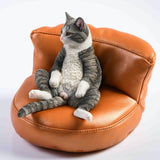 -Nicely detailed 1:6 scale fat cat figurine with faux leather sofa display stand. Cat is crafted in high quality resin and measures approximately 7.5 cm / 2.9 inches tall. New in box, guaranteed quality. Free shipping.

Funny sweet realistic collectible 1/6 orange black white brown gray tabby kitty figure gift -