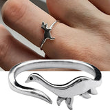 -Adorable adjustable dinosaur rings: t-rex, stegosaurus, triceratops or plesiosaur. Well made in aluminum alloy, one size fits most. Free shipping worldwide. 

Dino tyrannosaurus tyrannosaur trex stego plesiosaurus nessie loch ness monster open size wraparound band jewelry cute playful stylish fashion kids adults unisex-