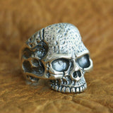 -Sterling Silver Road Rash Skull Ring Highly detailed human skull biker ring handcrafted in .925 sterling silver, treated with jeweler's antiquing and highly polished for the best possible presentation.Available in full and half US sizes 7-15. Measures approximately 26mm / 1 inch and weighs approximately 0.71oz in sterling si-
